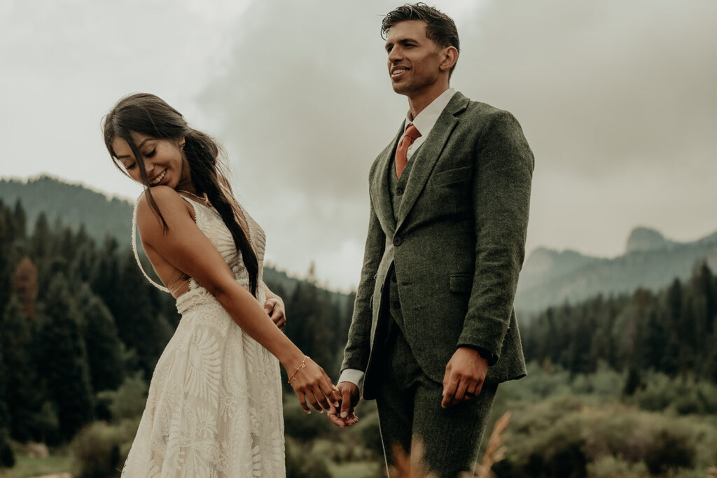 Micro wedding ceremony at Panorama Point, Golden Gate Canyon Park. Newly Wed portraits with the Colorado Rocky Mountains