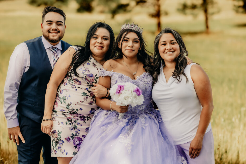 Quinceañera family portraits with mom and gradnma and brother