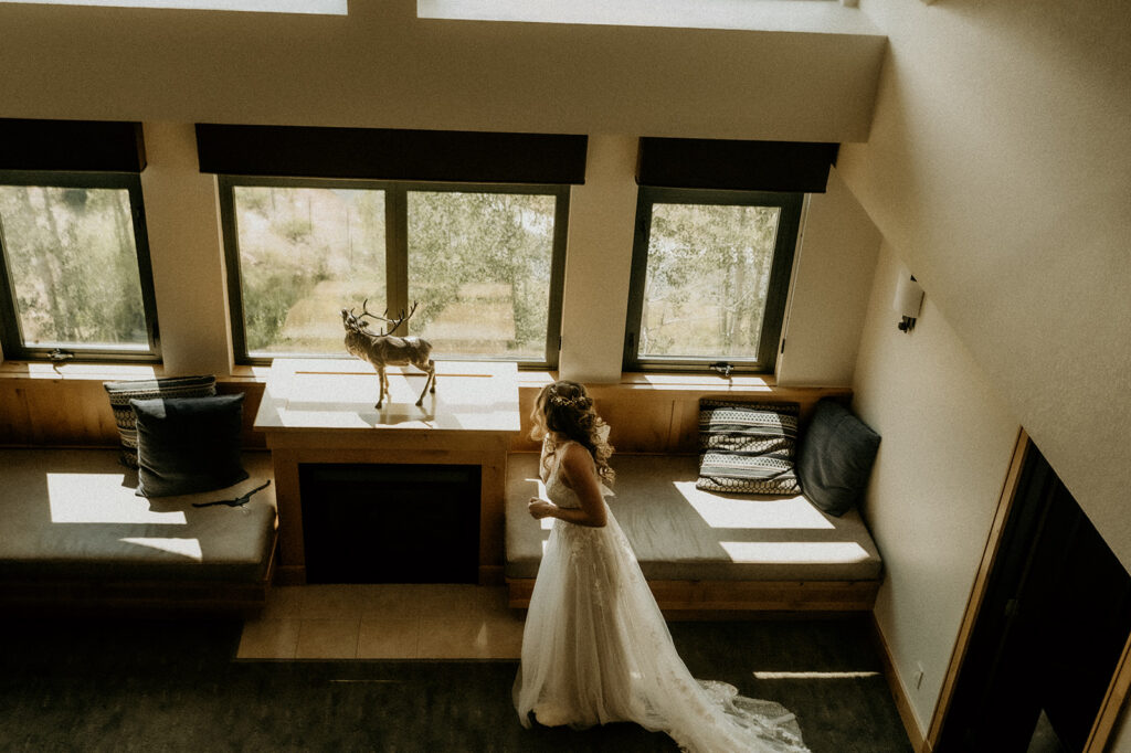 bride dressed and ready to head out to the ceremony site. Sweet moments just before