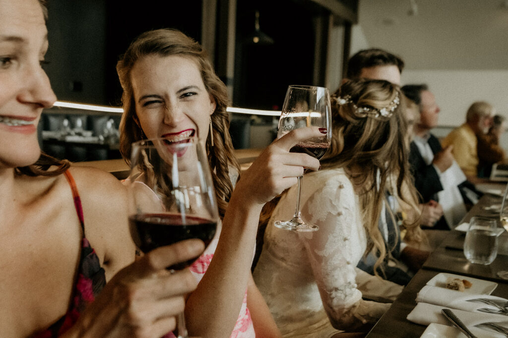 sitting at the reception table with the bride and groom is perfection. i get to capture sweet moments and be in on the inside jokes