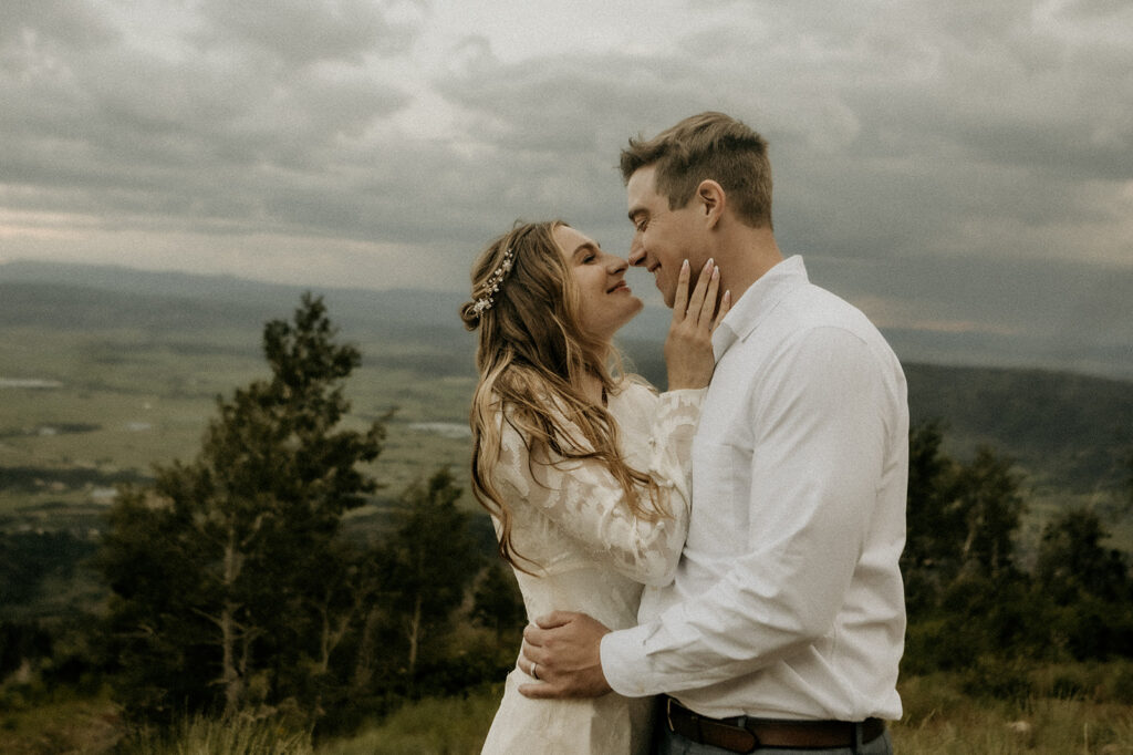 natural light photography at the top of the mountain in steamboat springs of the bride and groom 