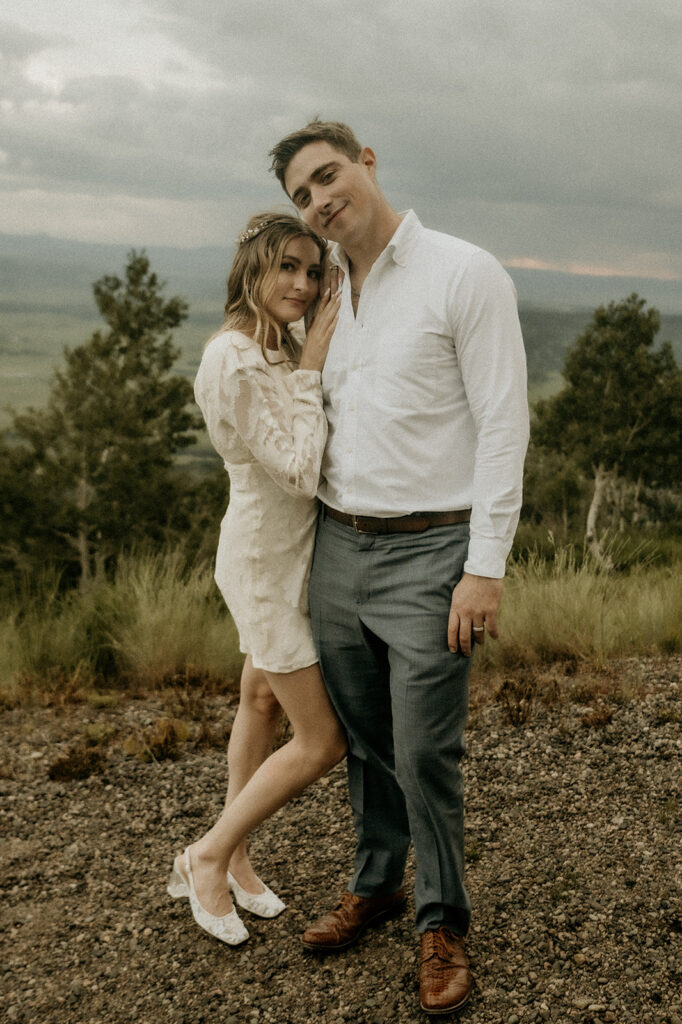 sunset and blue hour bride and groom portraits on top of the mountain in Steamboat Springs