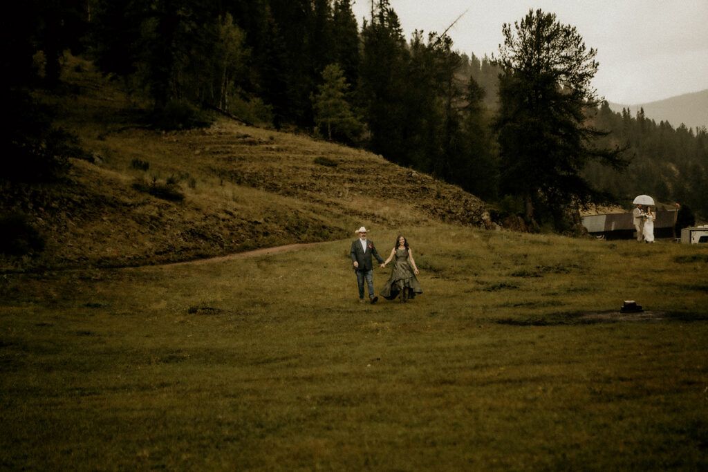 parents of the bride walking to the ceremony during the precession