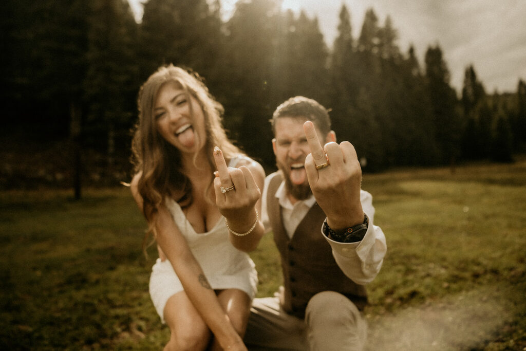 newly weds showing off their rings in style at the elk glade ranch in cascasde colorado